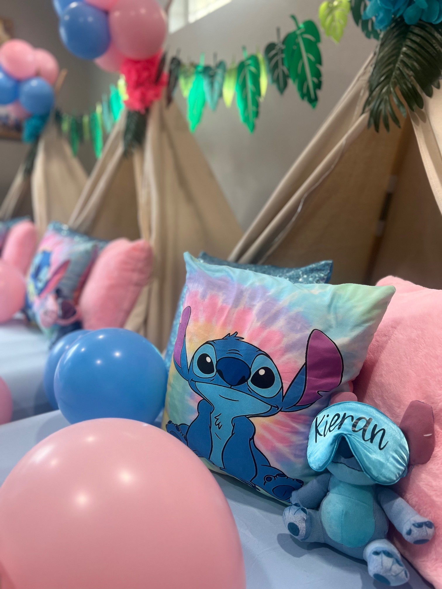 Adorable Stitch-themed setup featuring blue hues, playful decor, and whimsical touches.